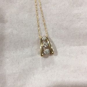 Diamond pendant on 16 in” chain.
